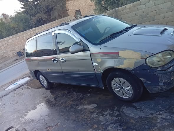 كيا كرنفال 2001 - صورة 2