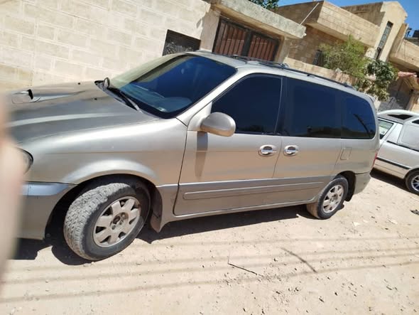 كيا كرنفال 2001 - صورة 2