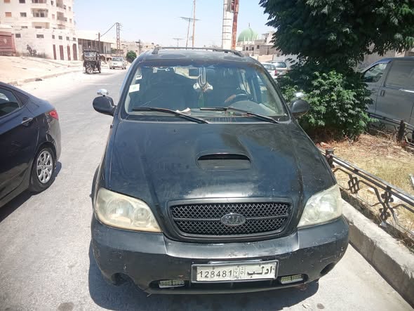 كيا كرنفال 2005 - صورة 5