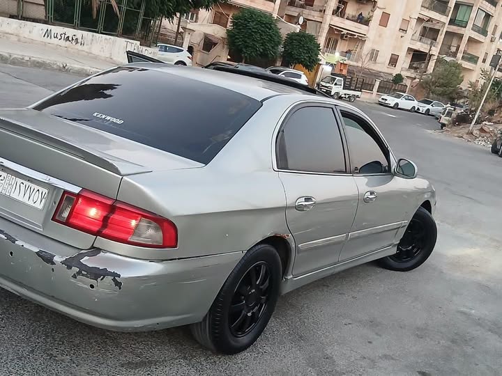 كيا اوبتما 2003