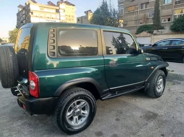 سانغ يونغ كوراندو 2000 - صورة 4