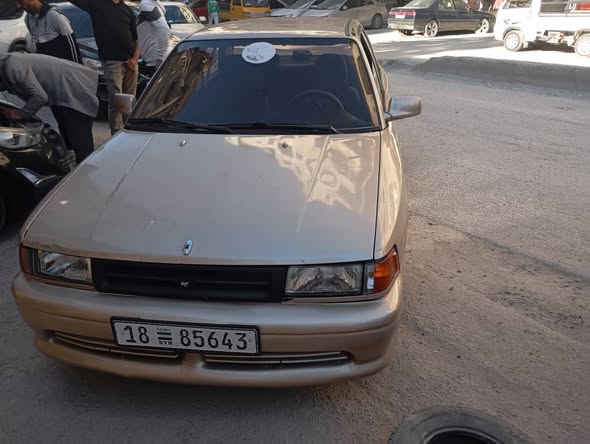 مازدا 323 1993 - صورة 1