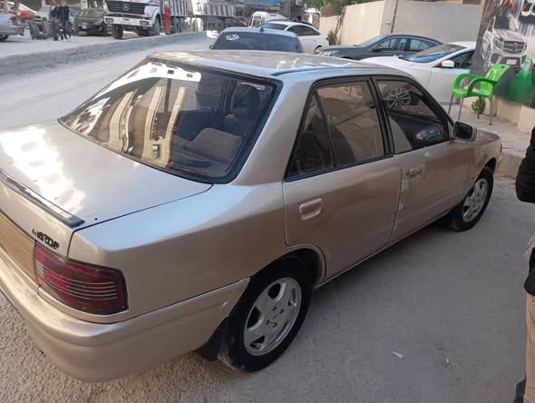 مازدا 323 1993 - صورة 2