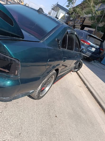متسوبيشي لانسر 1998 - صورة 4