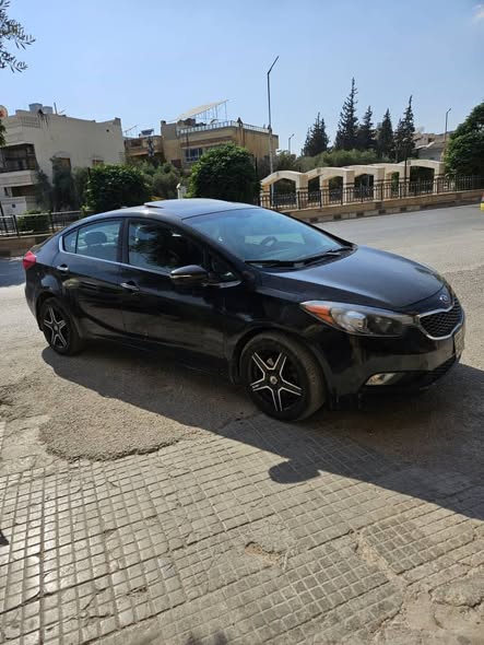 كيا فورتي 2015 - صورة 1