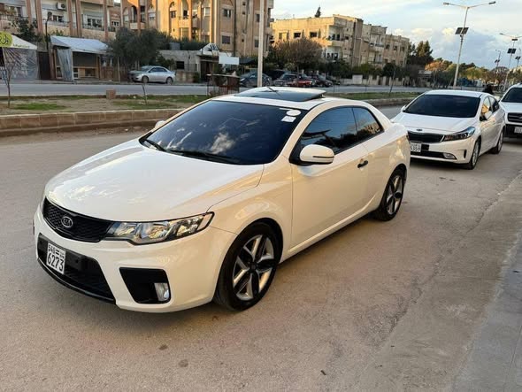 كيا فورتي 2013 - صورة 2