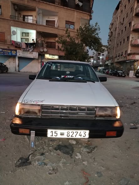 نيسان ساني 1983 - صورة 1