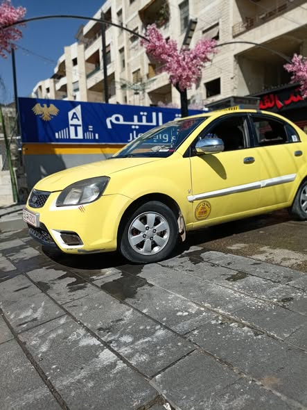 كيا ريو 2011 - صورة 1