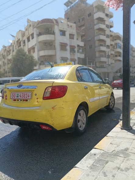كيا ريو 2011 - صورة 5