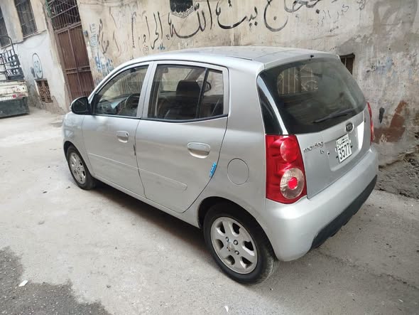 كيا مورنغ 2011 - صورة 2