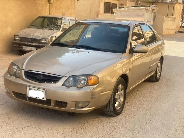 كيا شوما 2002 - صورة 3