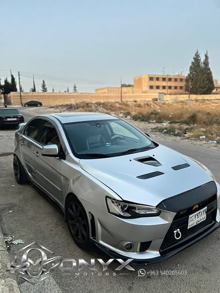 ميتسوبيشي لانسر 2009 - صورة 2