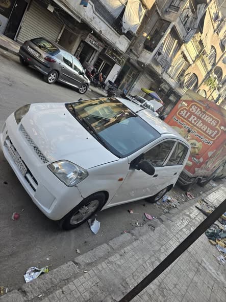 ديهاتسون شاراد 2004 - صورة 1