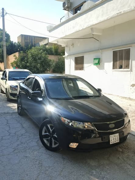 كيا فورتي 2012 - صورة 1