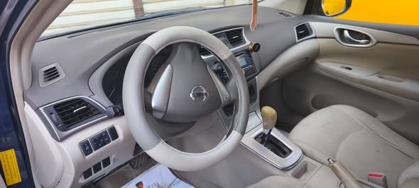 نيسان تيدا 2014 - صورة 4