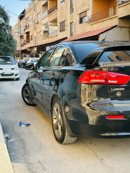 متسوبيشي لانسر 2008 - صورة 4