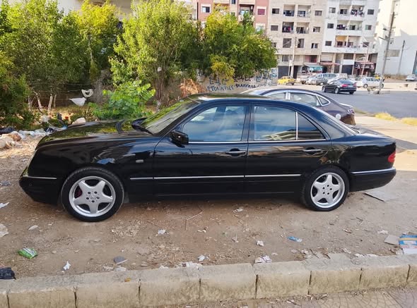 مرسيدس E200 1996 - صورة 4