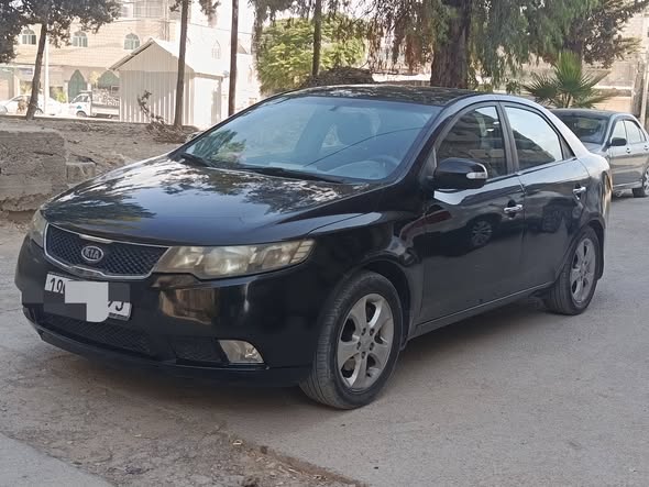 كيا فورتي 2010 - صورة 1
