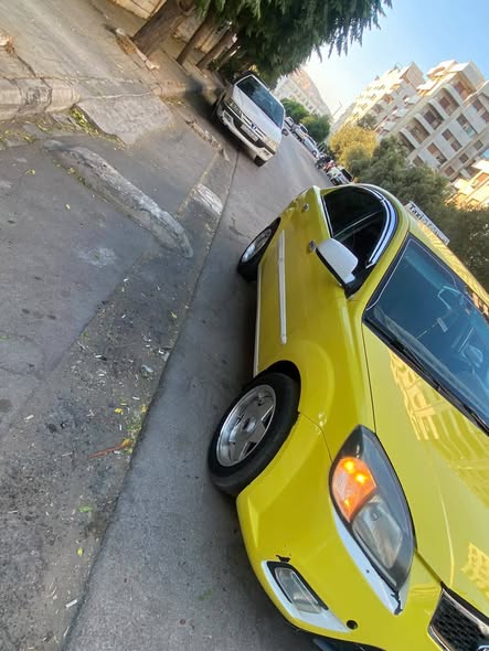 كيا ريو 2011 - صورة 1