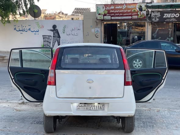 ديهاتسو ستوريات 2002 - صورة 3