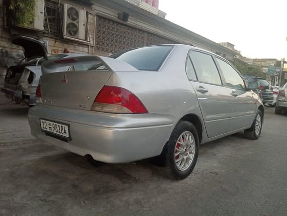 ميتسوبيشي لانسر 2002 - صورة 4