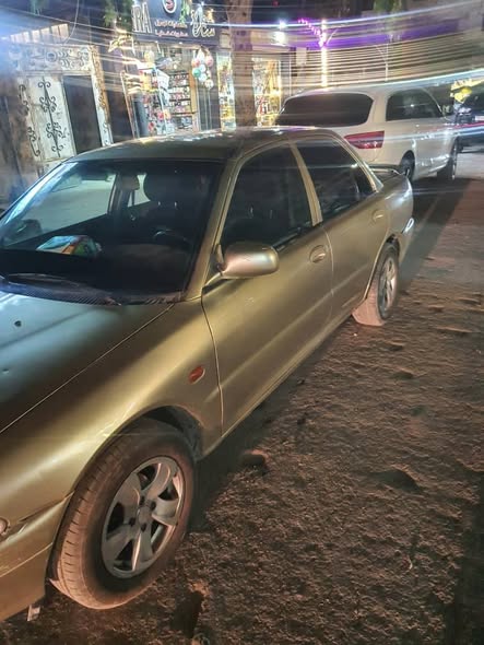 بروتون جين 2 2003 - صورة 1