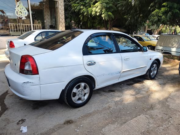 كيا شوما 2003 - صورة 4