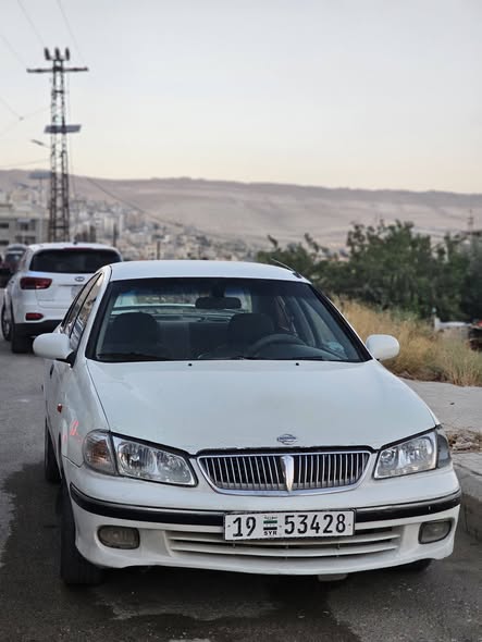 نيسان صني 2003 - صورة 1