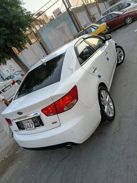 كيا فورتي 2011 - صورة 2