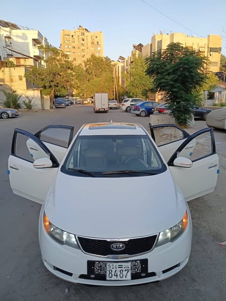 كيا فورتي 2011 - صورة 5