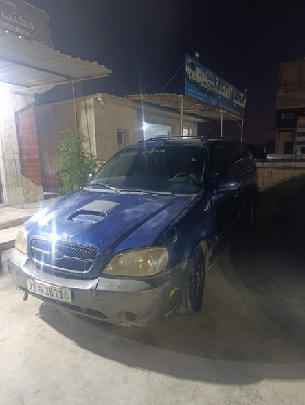 كيا كرنفال 2005 - صورة 2