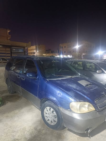 كيا كرنفال 2005 - صورة 3