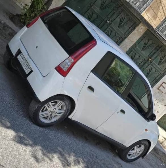 دايهاتسو شاراد 2004 - صورة 1