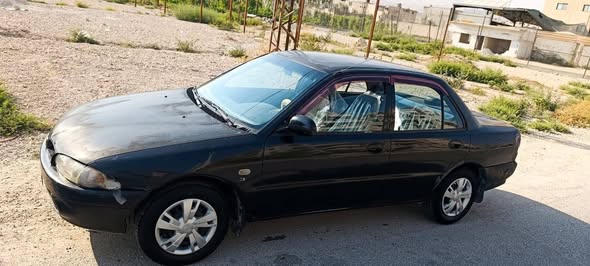 بروتون ويرا 2005 - صورة 2