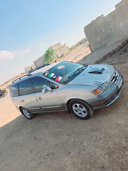 هيونداي تراجيت 2003 - صورة 3