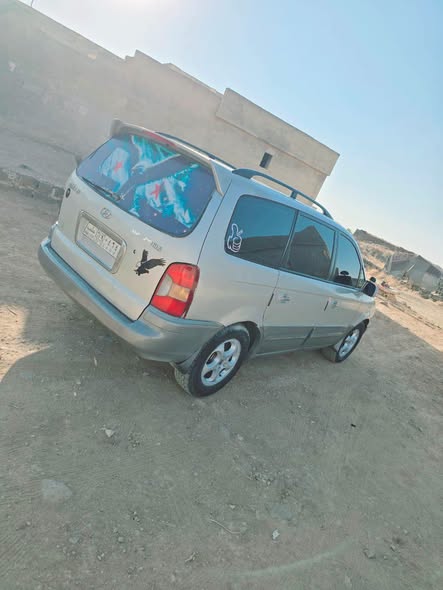 هيونداي تراجيت 2003 - صورة 4