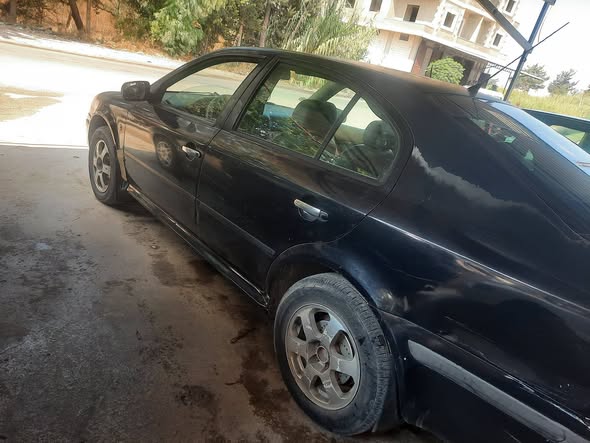 سكودا أوكتافيا 2002 - صورة 3