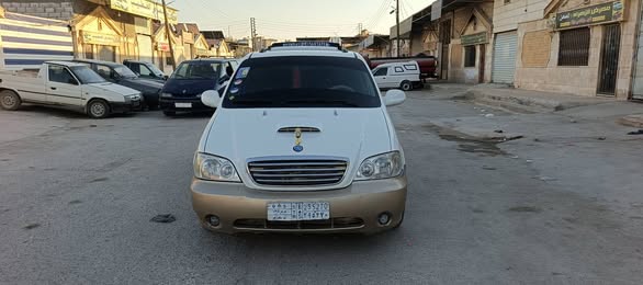 كيا كرنفال 2002 - صورة 2