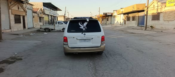 كيا كرنفال 2002 - صورة 5