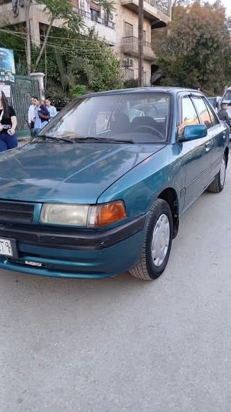 مازدا 323 1993 - صورة 1