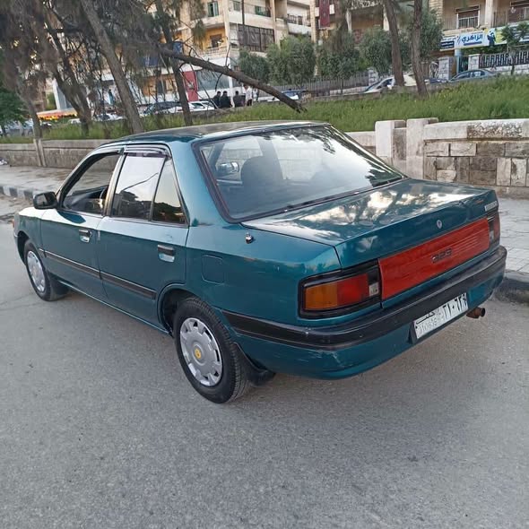 مازدا 323 1993 - صورة 3