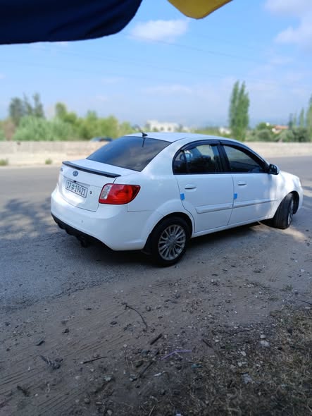 كيا ريو 2011 - صورة 1