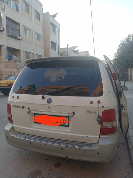 كيا كرنفال 2006 - صورة 4