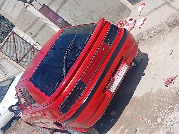 مازدا 323 1991 - صورة 1