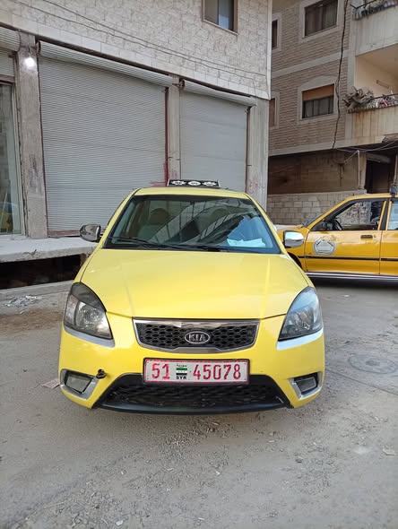 كيا ريو 2011 - صورة 1
