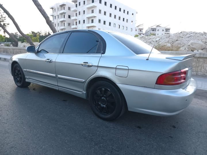 كيا أوبتيما 2002