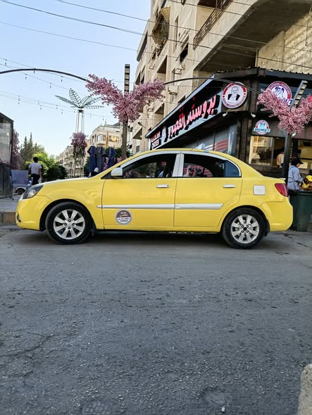 كيا ريو 2011 - صورة 1