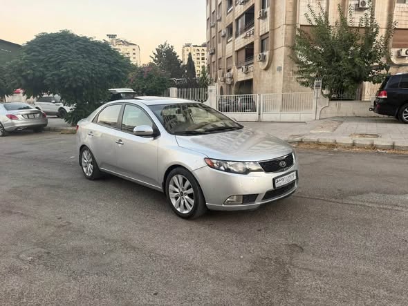 كيا فورتي 2011 - صورة 2