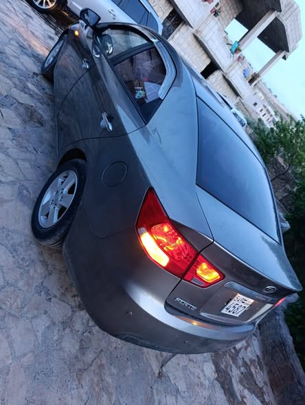 كيا فورتي 2011 - صورة 5