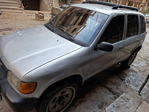 كيا سبورتاج 1995 - صورة 1